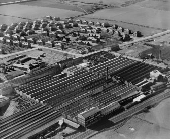 R and A Main Ltd. Gothic Works, Glasgow Road, Camelon, Falkirk.  Oblique aerial photograph taken facing west.
