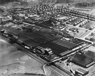 R and A Main Ltd. Gothic Works, Glasgow Road, Camelon, Falkirk.  Oblique aerial photograph taken facing south.