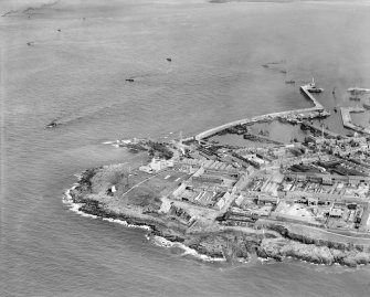 Fraserburgh, general view, showing Fraserburgh Harbour and Kinnaird Head.  Oblique aerial photograph taken facing east.