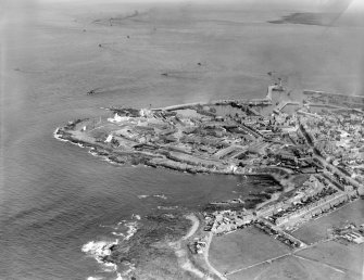 Fraserburgh, general view, showing Fraserburgh Harbour and Kinnaird Head.  Oblique aerial photograph taken facing east.