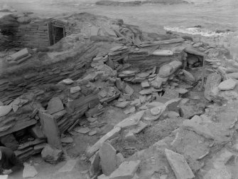 Excavation photograph: House 2, showing both main entrance and passage entrance. House 1 beyond.
Copy negative 1995. Original print in Print Room.