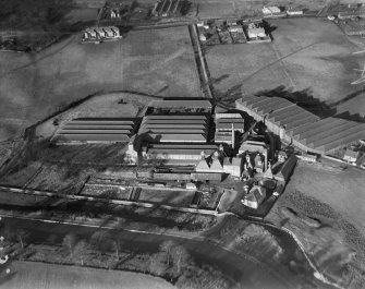 James Buchanan and Co. Lt. Bankier Distillery, Banknock.  Oblique aerial photograph taken facing north.