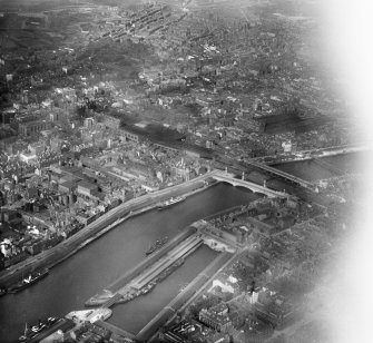 Glasgow, general view, showing Central Station, George the Fifth Bridge and Glasgow Bridge.  Oblique aerial photograph taken facing north-east.