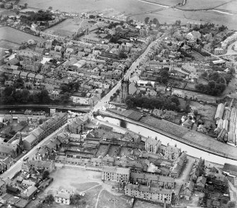 Kirkintilloch, general view, showing St Mary's Parish Church, Cowgate and Forth and Clyde Canal.  Oblique aerial photograph taken facing north-west.