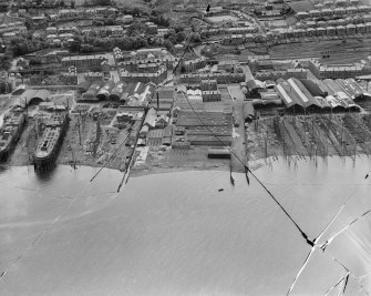 Port Glasgow and Newark Sailcloth Co. Ltd., Kingston Yard, Ardgowan Street, Port Glasgow.  Oblique aerial photograph taken facing south-west.  This image has been produced from a damaged negative.