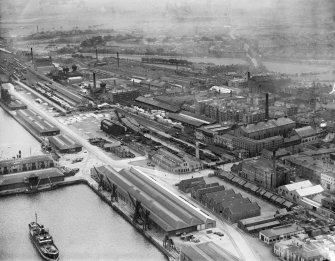 Edinburgh, general view, showing Garland and Roger Ltd. Timber Yard, Baltic Street and Leith Links.  Oblique aerial photograph taken facing south.