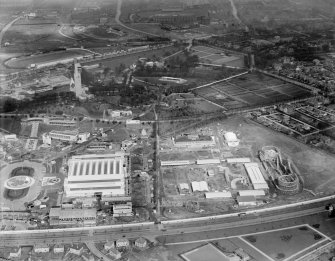 Amusements Park, Palace of Engineering and Tower of Empire, 1938 Empire Exhibition, Bellahouston Park, Glasgow, under construction.  Oblique aerial photograph taken facing north.