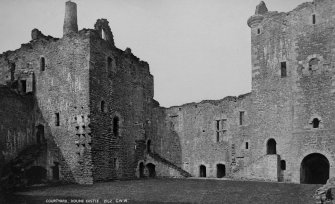 Copy of historic photograph showing view of courtyard from SE.