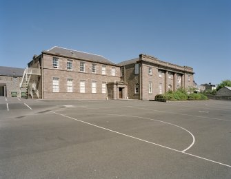 View of west wing and central block from SW.