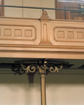 Interior, ground floor, assembly hall, detail of balcony front and column capital