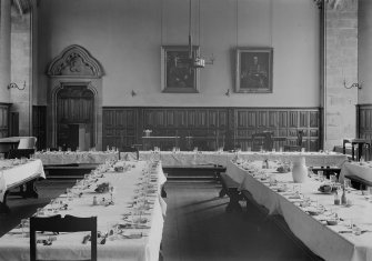 General view of the dining hall at Trinity College, Glenalmond with the tables set for afternoon tea.