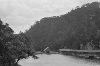 General view of pier and boathouse.