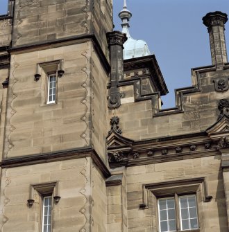 Detail of chimney, shield and carved pediment on south front