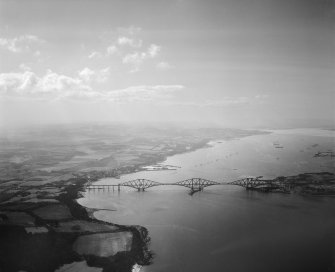 Forth Rail Bridge, Firth of Forth and Queensferry.  Oblique aerial photograph taken facing west.