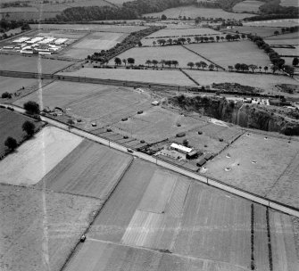 W and A Auld Ballochmyle Hatchery, Mauchline.  Prisoner of War Camp 112, Kingencleugh.  Oblique aerial photograph taken facing south.  This image has been produced from a crop marked negative.