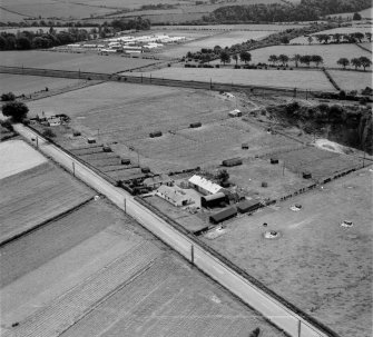 W and A Auld Ballochmyle Hatchery, Mauchline.  Prisoner of War Camp 112, Kingencleugh.  Oblique aerial photograph taken facing south.