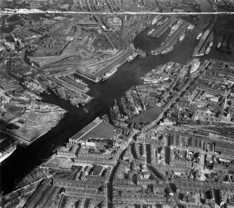 Glasgow, general view, showing Queen's Dock and Harland and Wolff Shipbuilding Yard, Clydebrae Street, Govan.  Oblique aerial photograph taken facing east.  This image has been produced from a crop marked negative.