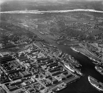 Glasgow, general view, showing Harland and Wolff Shipbuilding Yard, Clydebrae Street, Govan and Castlebank Street.  Oblique aerial photograph taken facing north.  This image has been produced from a crop marked negative.