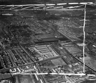 Glasgow, general view, showing Harland and Wolff Clyde Foundry, 184 Helen Street and Shieldhall Road, Govan.  Oblique aerial photograph taken facing north-east.  This image has been produced from a crop marked negative.