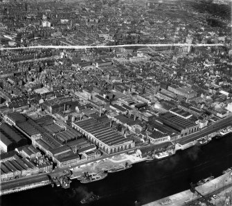 Glasgow, general view, showing Harland and Wolff Diesel Engine Works, 181 Lancefield Street and Argyle Street.  Oblique aerial photograph taken facing north-east.  This image has been produced from a crop marked negative.
