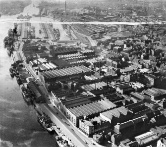Glasgow, general view, showing Harland and Wolff Diesel Engine Works, 181 Lancefield Street and Queen's Dock.  Oblique aerial photograph taken facing north-west.  This image has been produced from a crop marked negative.