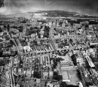 St Andrews, general view, showing Madras College and Hope Park Parish Church.  Oblique aerial photograph taken facing north.