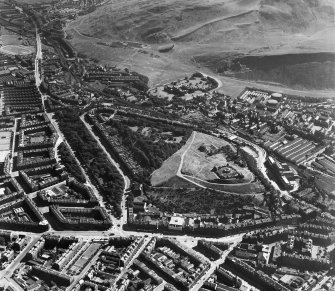 Edinburgh, general view, showing Calton Hill and Holyrood Park.  Oblique aerial photograph taken facing east.