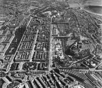 Edinburgh, general view, showing Princes Street and Edinburgh Castle.  Oblique aerial photograph taken facing east.