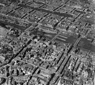 Edinburgh, general view, showing Waverley Station and Chambers Street.  Oblique aerial photograph taken facing north-west.