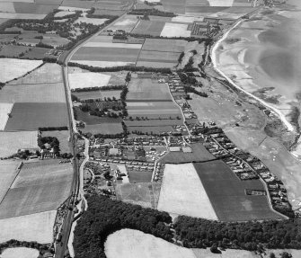 Longniddry, general view, showing Longniddry Golf Course and Main Street.  Oblique aerial photograph taken facing west.