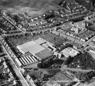 Ballantyne Brothers and Co. Ltd. March Street Mills, Peebles.  Oblique aerial photograph taken facing west.  This image has been produced from a crop marked negative.
