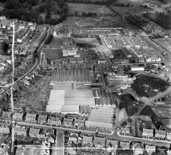 Ballantyne Brothers and Co. Ltd. March Street Mills, Peebles.  Oblique aerial photograph taken facing north.  This image has been produced from a crop marked negative.