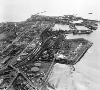 Shell Refining Co. Ltd. Ardrossan Refinery and Ardrossan Harbour.  Oblique aerial photograph taken facing south.