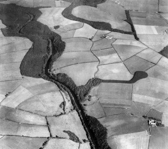 Coilsholm Wood and River Ayr, Tarbolton.  Oblique aerial photograph taken facing east. 