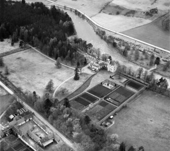 Abergeldie Castle and Walled Garden, Balmoral Estate.  Oblique aerial photograph taken facing west.