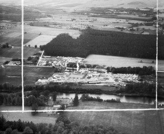 A and G Paterson Ltd. Silverbank Saw Mills, Banchory.  Oblique aerial photograph taken facing north.  This image has been produced from a crop marked negative.