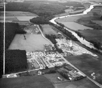 A and G Paterson Ltd. Silverbank Saw Mills, Banchory.  Oblique aerial photograph taken facing east.  This image has been produced from a crop marked negative.