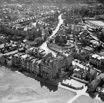 St Andrews, general view, showing Rusack's Hotel, Pilmour Links and City Road.  Oblique aerial photograph taken facing south.