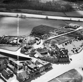 Huntly Arms Hotel, Charlestown Road and Cattle Market, Aboyne.  Oblique aerial photograph taken facing south-east.  This image has been produced from a crop marked negative.