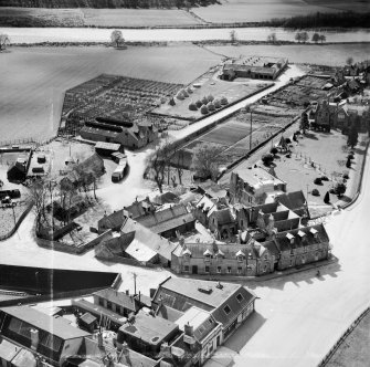Huntly Arms Hotel, Charlestown Road and Cattle Market, Aboyne.  Oblique aerial photograph taken facing south.  This image has been produced from a crop marked negative.