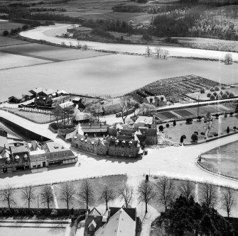 Huntly Arms Hotel, Charlestown Road and Cattle Market, Aboyne.  Oblique aerial photograph taken facing south-east.  This image has been produced from a crop marked negative.