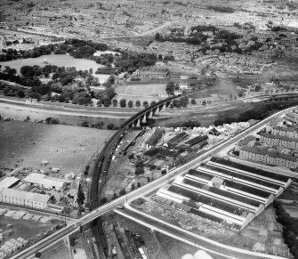 Aberdeen, general view, showing A and G Paterson Ltd. Craiginches Saw Mills and Harpers Ltd. Craiginches Ironworks.  Oblique aerial photograph taken facing north-west.