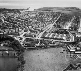 Aberdeen, general view, showing A and G Paterson Ltd. Craiginches Saw Mills and Balnagask Road.  Oblique aerial photograph taken facing north-east.
