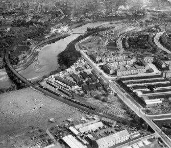 Aberdeen, general view, showing A and G Paterson Ltd. Craiginches Saw Mills and Wellington Road.  Oblique aerial photograph taken facing north.