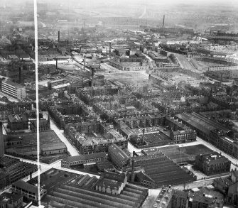 Glasgow, general view, showing David and John Anderson Ltd. Atlantic Mills, Walkinshaw Street and Dunn Street.  Oblique aerial photograph taken facing north-east.  This image has been produced from a crop marked negative.