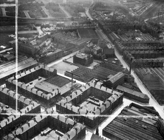 Glasgow, general view, showing David and John Anderson Ltd. Atlantic Mills, Walkinshaw Street and Baltic Street.  Oblique aerial photograph taken facing south.  This image has been produced from a crop marked negative.