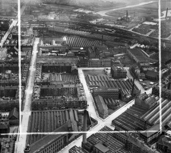Glasgow, general view, showing David and John Anderson Ltd. Atlantic Mills, Walkinshaw Street and Bernard Street.  Oblique aerial photograph taken facing east.  This image has been produced from a crop marked negative.