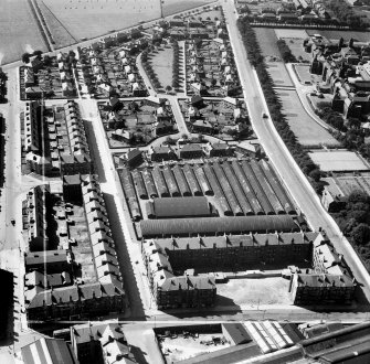 Glasgow, general view, showing Arbuckle Smith and Co. Warehouse, Moss Road and Burghead Drive.  Oblique aerial photograph taken facing south.  This image has been produced from a crop marked negative.