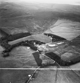 Cranshaws Castle and grounds.  Oblique aerial photograph taken facing west.  This image has been produced from a crop marked negative.