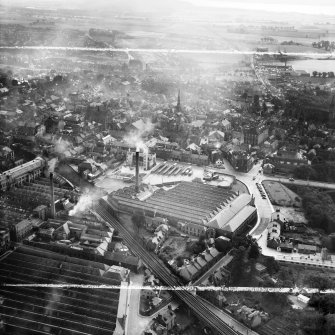 Dunfermline, general view, showing Winterthur Silks Ltd. Canmore Works, Bruce Street and Carnegie Drive.  Oblique aerial photograph taken facing south.  This image has been produced from a crop marked negative.
